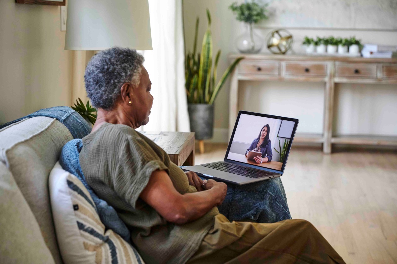 Senior woman on a video telemedicine call with a healthcare professional